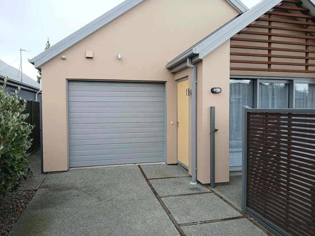 House exterior after plastering — fresh warm render finish