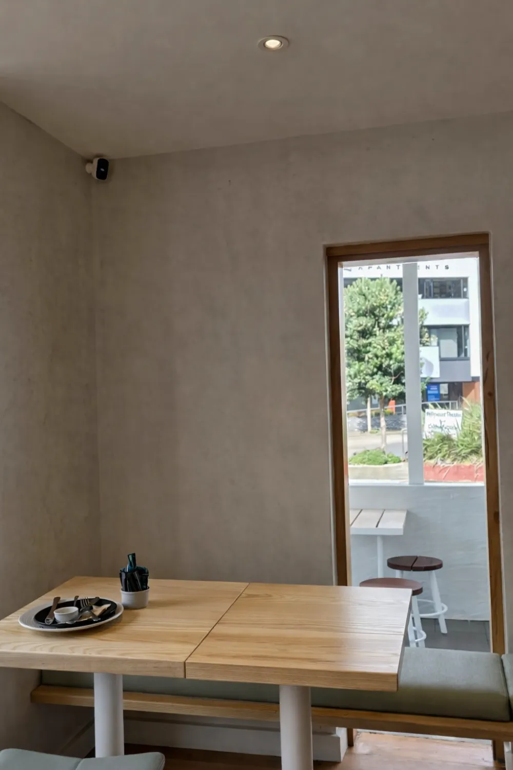 Cafe interior with smooth plastered walls and ceiling