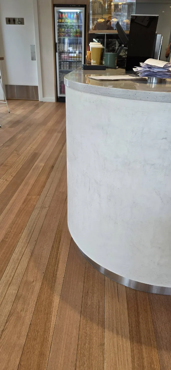 Curved polished-plaster cafe counter
